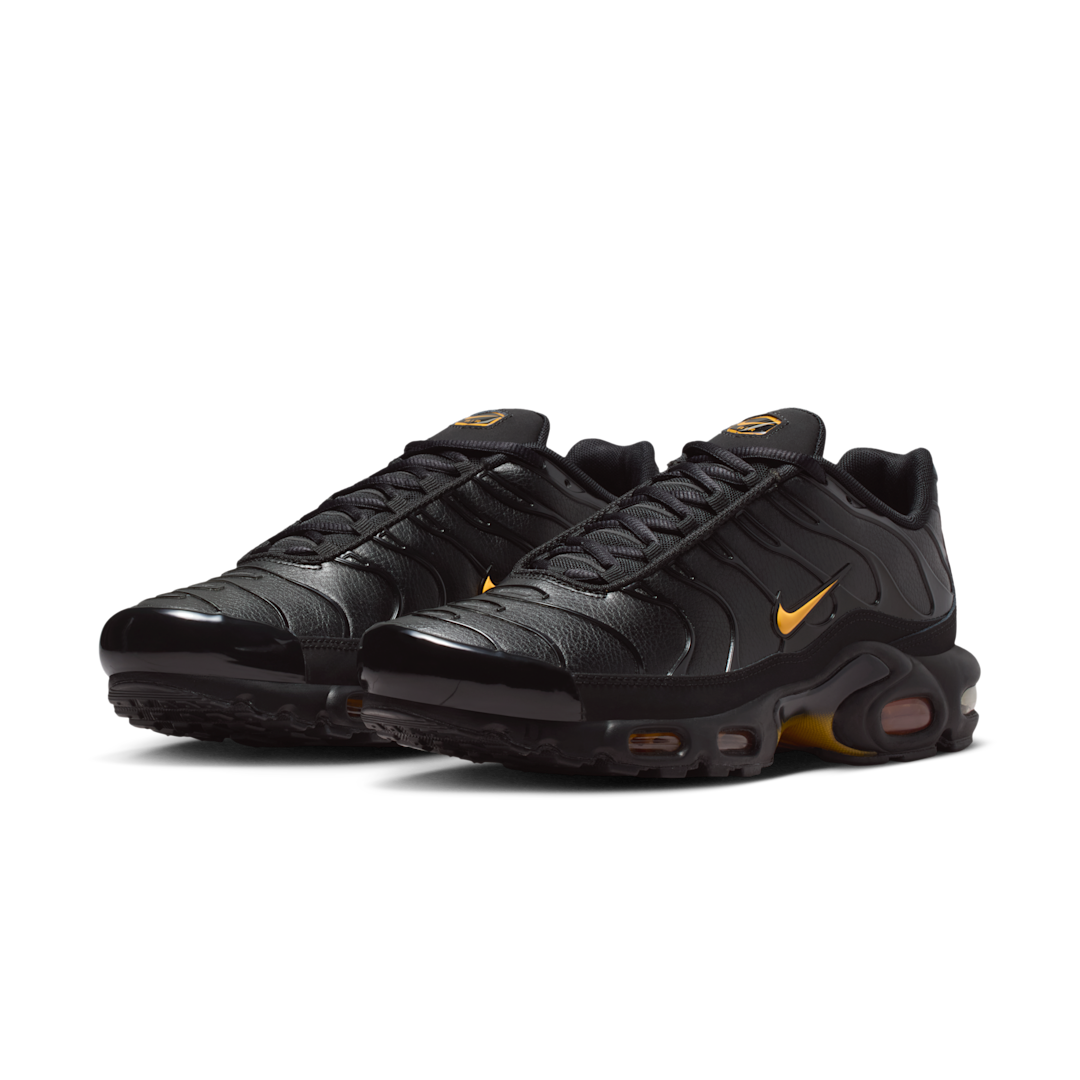 Detalle del talon de las Nike Air Max Plus Premium Black Laser Orange mostrando la unidad Air visible y el acolchado